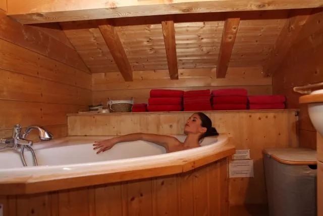 Bathroom with skylight located on the 1st floor with corner bath and spa option, a shower and a sink, hairdryer provided. Floor, flooring teak wood. 5 m2. 