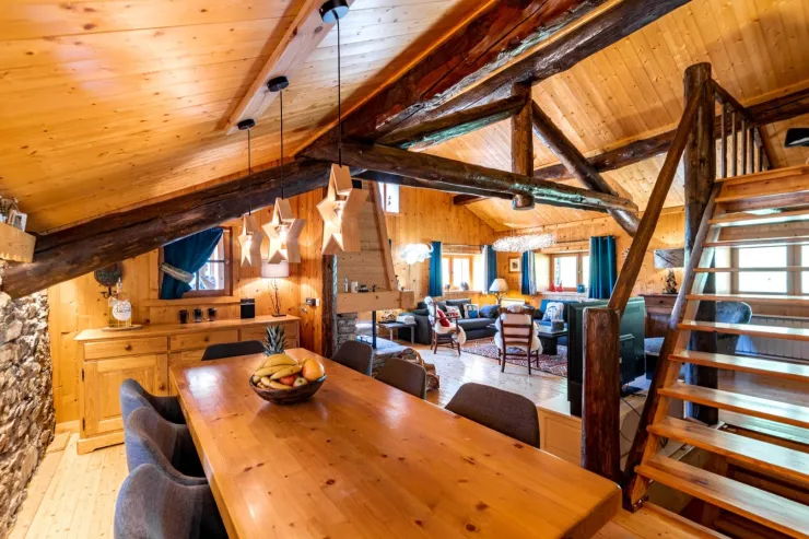 General view of the living area with stairs going up to the upper bedroom