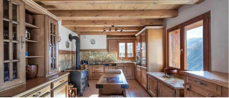 Fully equipped kitchen with even a wood stove.