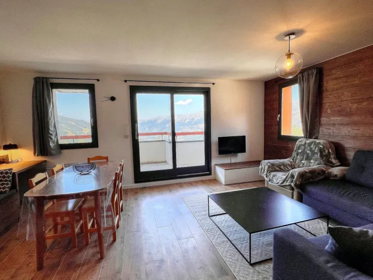 French windows to the balcony and views