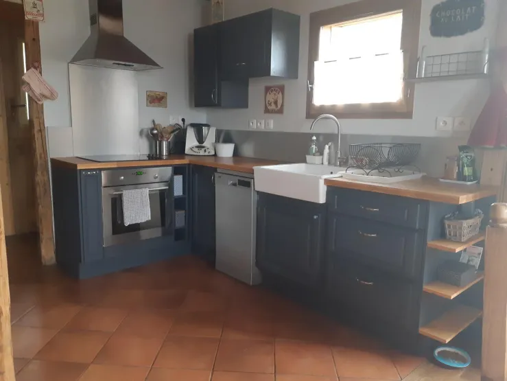 fully equipped kitchen open to dining room