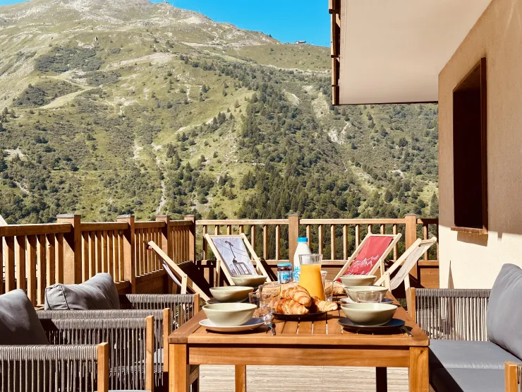 Large terrace with garden furniture, deck chairs, and sun loungers so you can enjoy the outdoors in summer and winter alike.