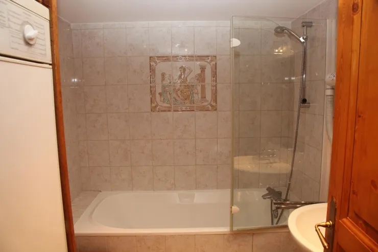 Bathroom with washing machine & tumble dryer MIELE