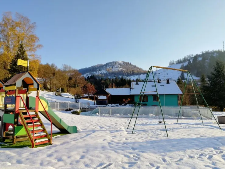 cottage with garden and beautiful toboggan run on the side of the house! but also snowmen, igloos ...