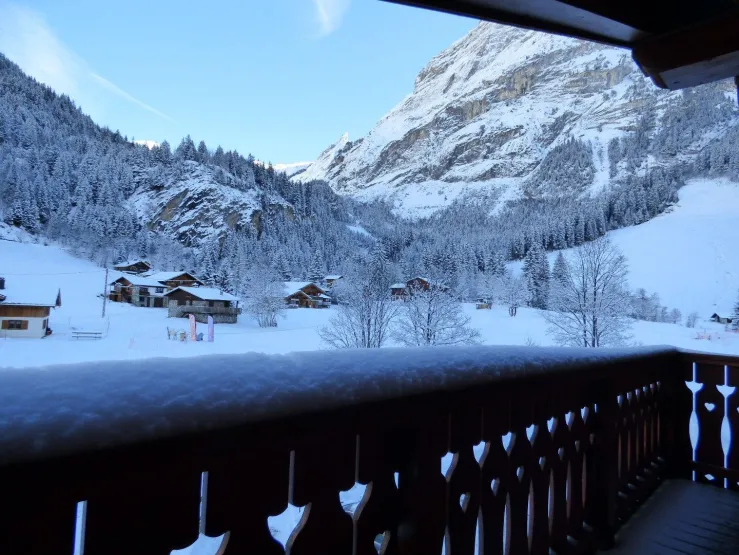 In winter, our terrasse full of snow in front of the mountain, in foot of the ESF ski-school for children