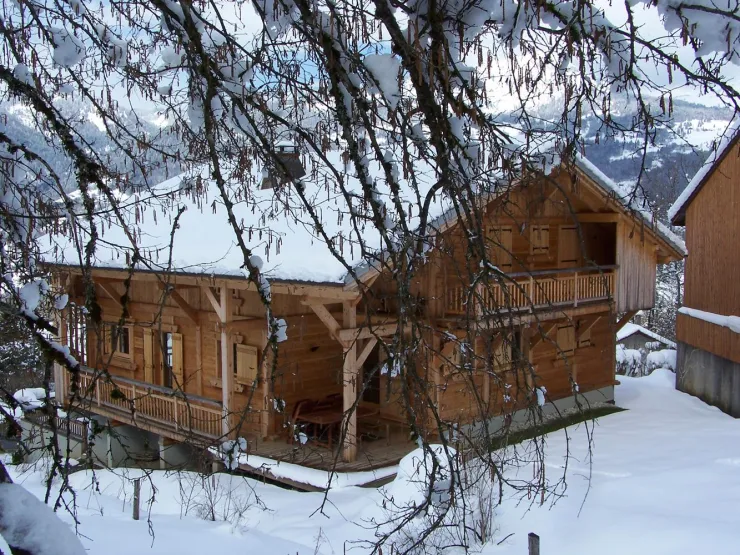The chalet in winter. West and south wall.
