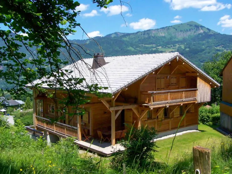 The chalet in summer. West and south wall.

