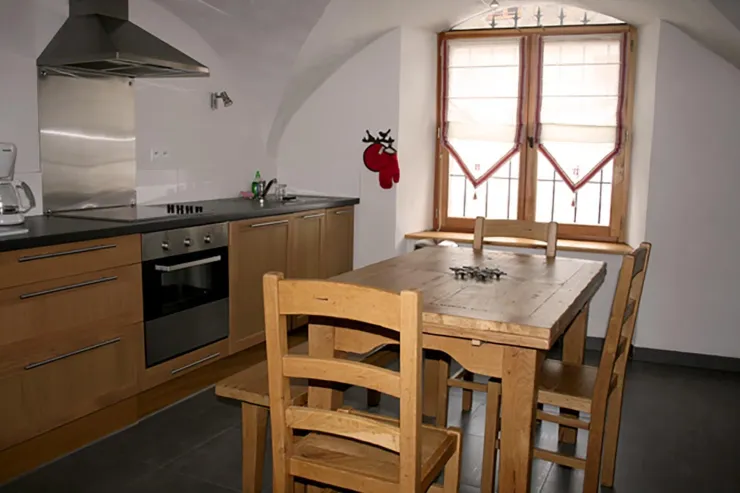 Large, fully equipped kitchen/dining room (fridge, glass-ceramic cooktop, self-cleaning oven, dishwasher, and microwave). Oak table (seats 6 to 8).