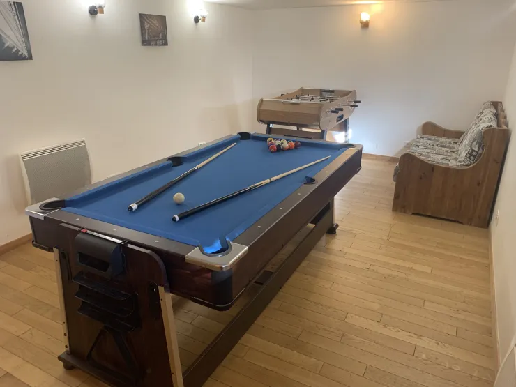 Games room with table football, billiards and air hockey