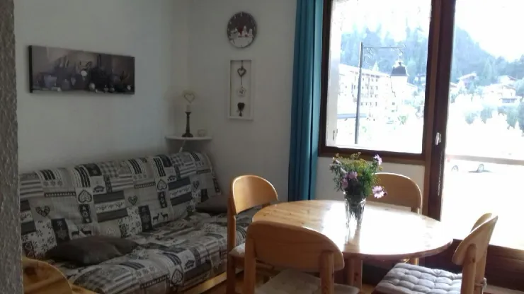 Living room with sofa bed and access to the balcony