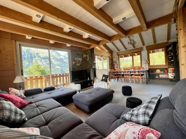 in front: resting area, with large and comfortable sofa, large TV
then: dining area
outstanding view over the Vanoise