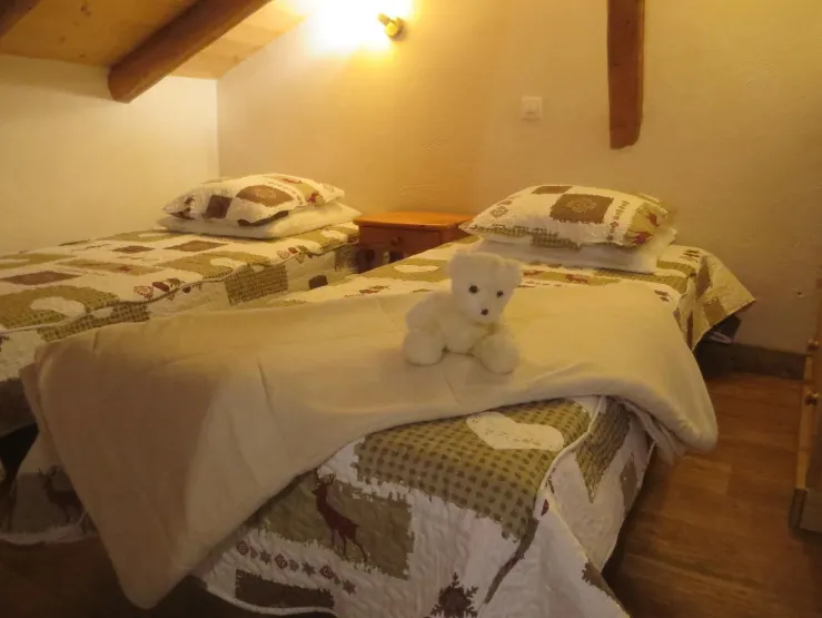South bedroom, three singles beds.
