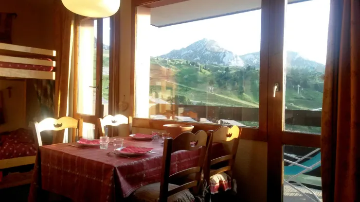 Dining area overlooking the mountain in summer