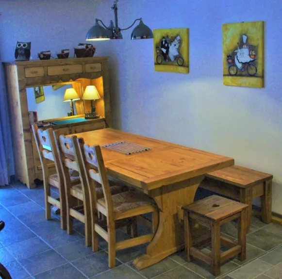 the dining room and its large monastery table for convivial meals ...