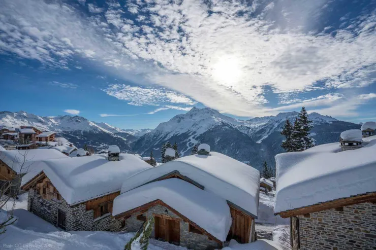 Well-known photo of La Rosière! In the foreground, in the centre, is the Chalet L'Esquirol, which we offer for rent, with the ski room and direct access to the slopes. In the background: Mont Pourri and the Pointe Rouge (Les Arcs). Photo Office du Tourism