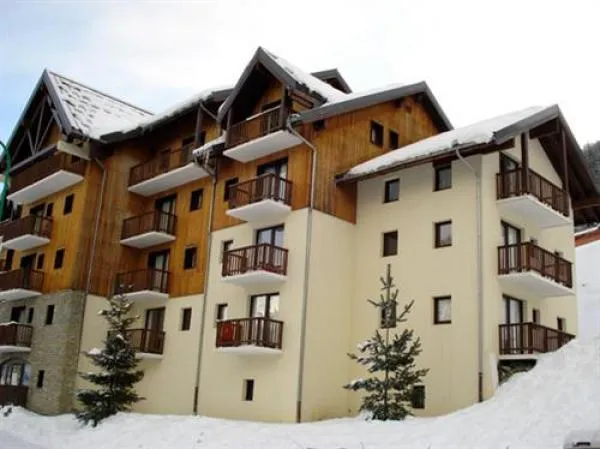 BUILDING SIDE ROAD On the right, last floor, no neighbors on it or on the sides. Very beautiful view of the Tabor and the Vanoise. South and 
