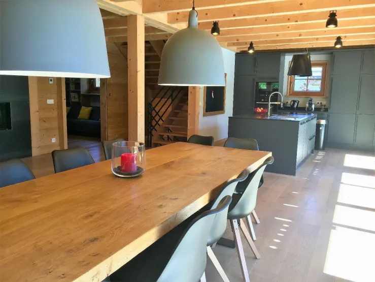 The dining room which overlooks the kitchen design and functional