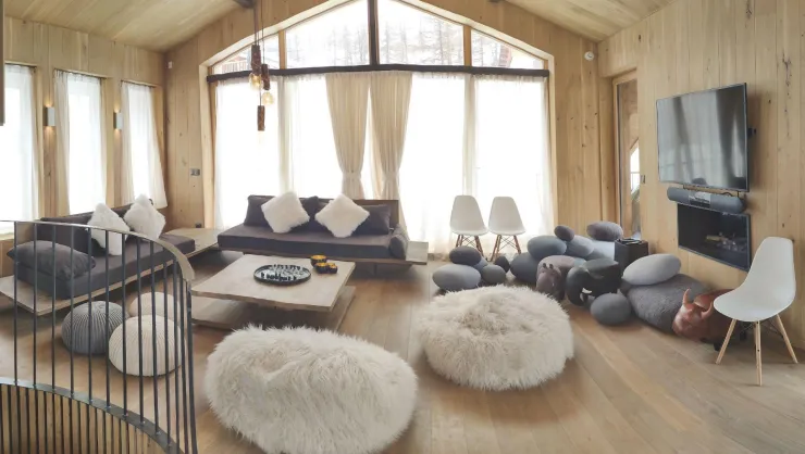 View of  living room with the track that passes in front of the chalet