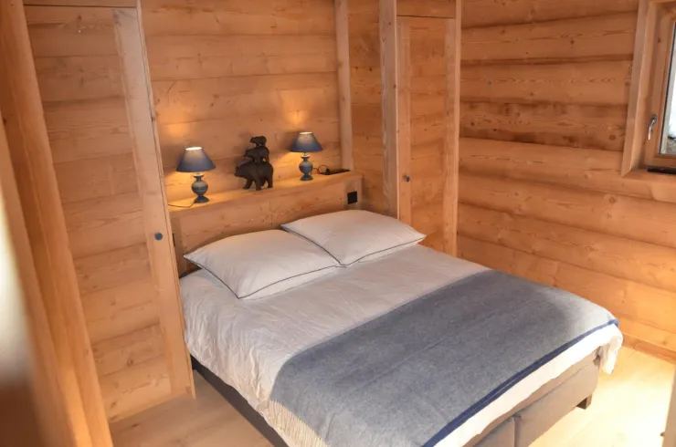 Master bedroom with window Queen size bed and storage